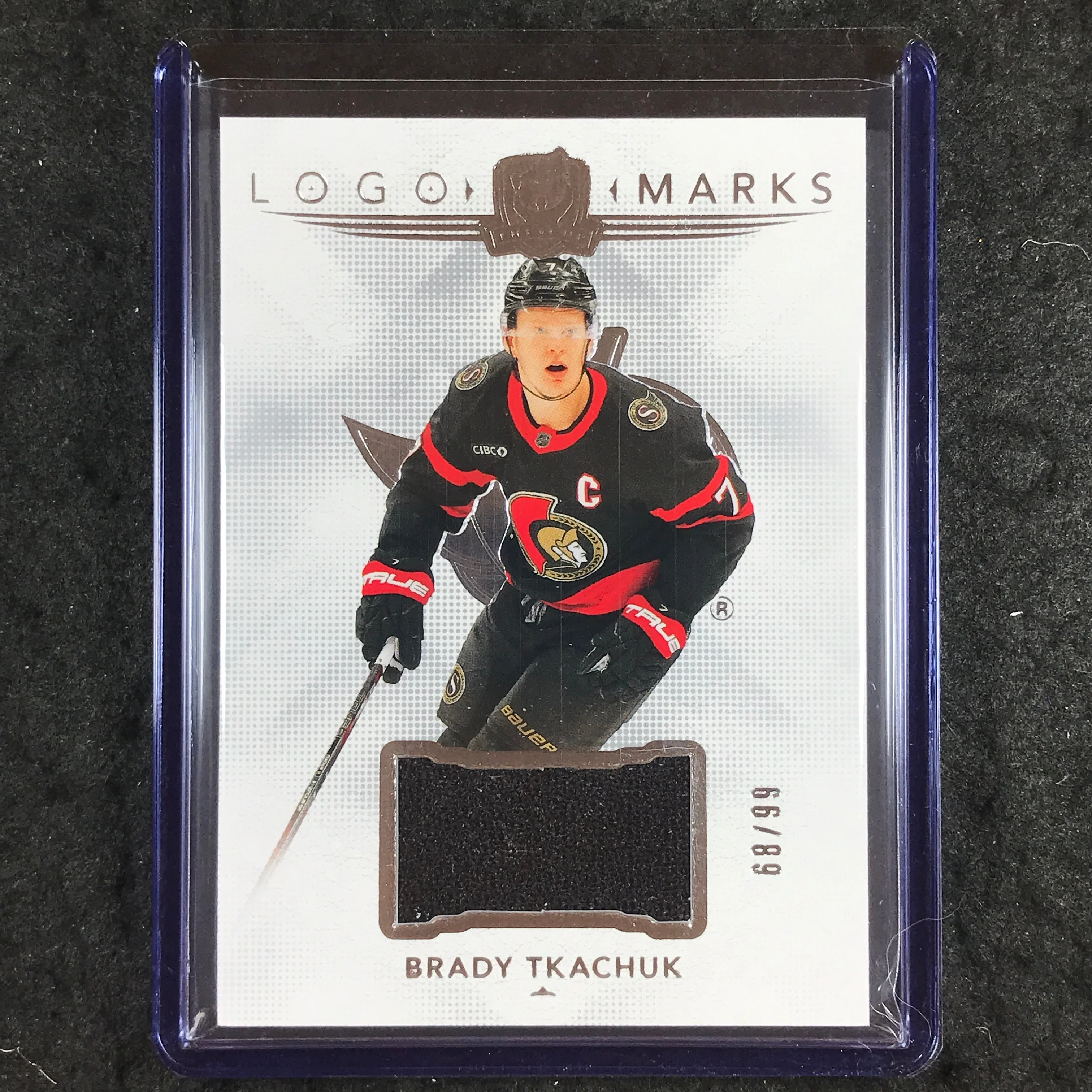 2024-25 The Cup Hockey BRADY TKACHUK Logomarks Jersey Relic 68/99