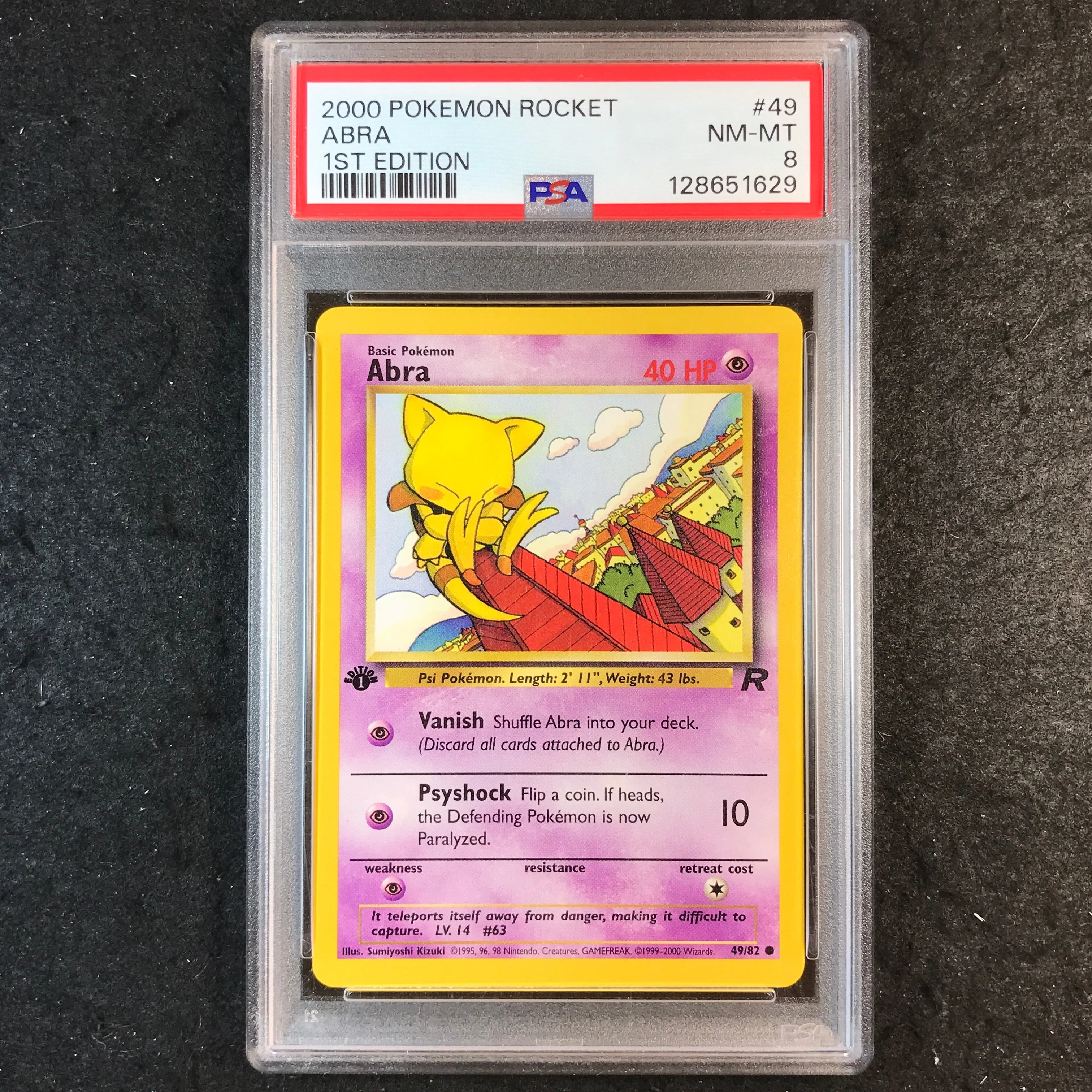 PSA 8 Abra - 49/82 - 2000 Rocket 1st Edition 629